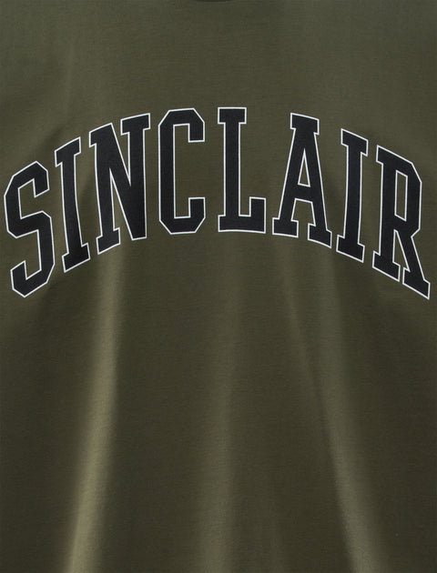 Olive green streetwear t-shirt with bold SINCLAIR varsity lettering on chest