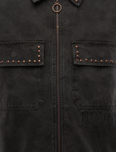 Black men's streetwear jacket with front zipper, studded chest pockets, and subtle embossed text