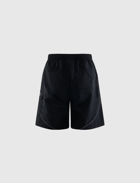 Black men's streetwear shorts with elastic waistband and side pocket, back view