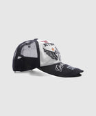 Black and white mesh trucker hat with embroidered eagle, star, and graphic patches