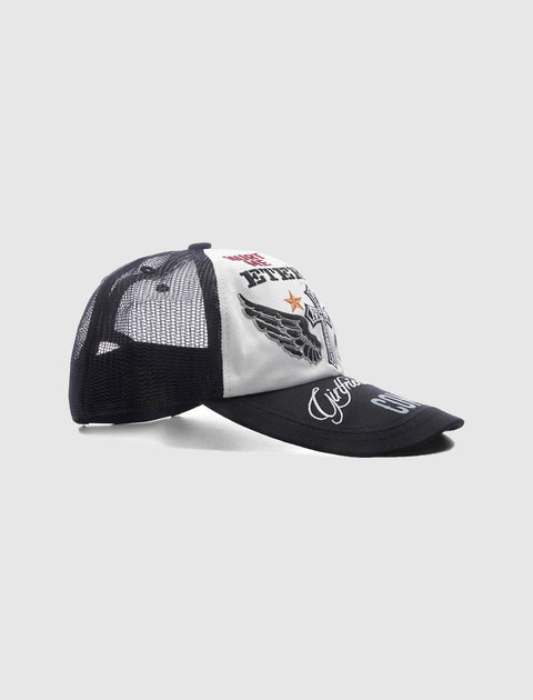 Black and white mesh trucker hat with embroidered eagle, star, and graphic patches