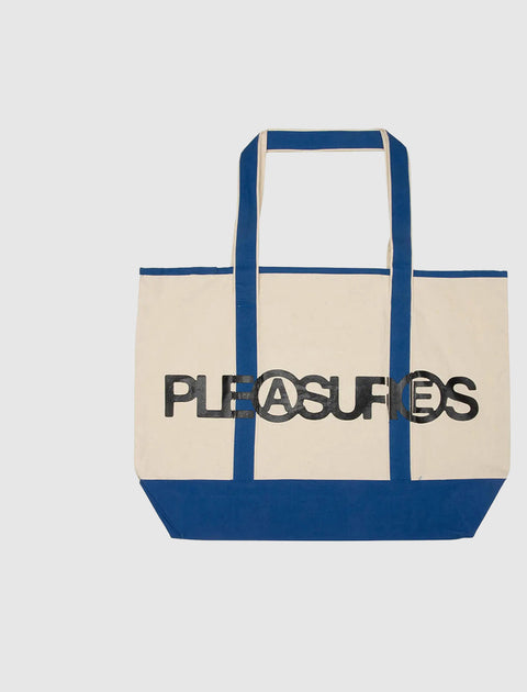 Large canvas tote bag with blue handles and accents, bold text logo on front
