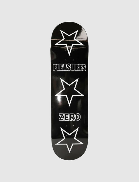 Black skateboard deck with white outlined stars and bold text reading Pleasures and Zero