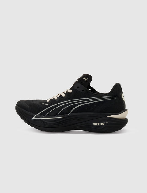 Black running sneaker with white accents, thick cushioned sole, side logo, and Nitro Elite branding