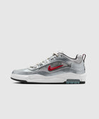 Metallic silver and white low-top sneaker with red side swoosh logo and visible air sole unit