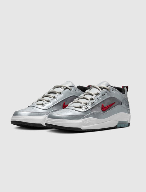Metallic silver and red men's sneakers with white soles and visible air cushioning