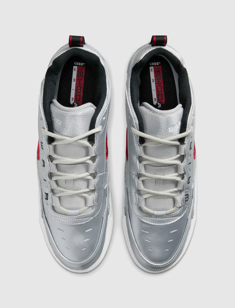 Metallic silver and varsity red low-top sneakers with white laces, top view