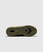 Close-up of khaki sneaker sole with star and arrow pattern, streetwear sneaker detail