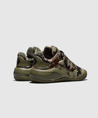 Men's sneakers in green camouflage print with black accents, side and rear view.