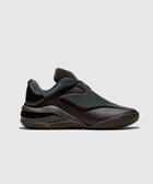 sleek black low-top sneaker with modern design and textured sole on white background