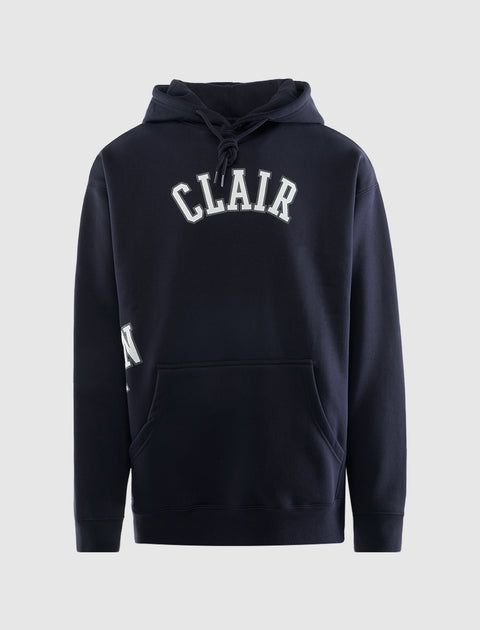 Navy blue men's hoodie with white 'CLAIR' text and kangaroo pocket, streetwear style