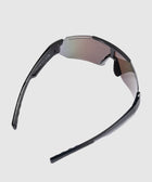 Black wraparound sunglasses with reflective shield lens on a white background