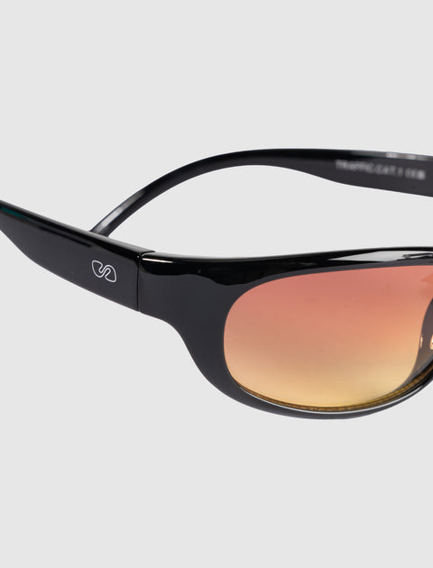 Black sunglasses with orange gradient lenses and a small white logo on the temple