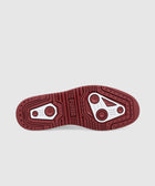 Red and white sneaker sole showing detailed traction pattern and PUMA logo on a white background