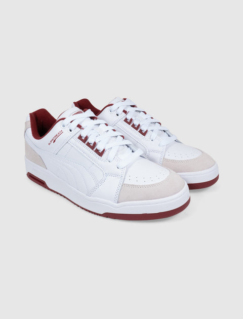 White and beige low-top sneakers with red accents and suede toe, men's streetwear shoes