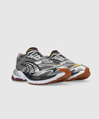 Men's metallic silver and black mesh sneakers with gum soles and athletic design