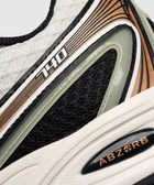 Close-up of sneaker with 740 and ABZORB details, black mesh and white textured sole
