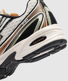 Close-up of a men's sneaker heel with ABZORB cushioning, mesh and synthetic details, labeled 740.