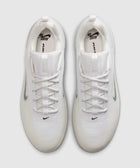 Top view of white mesh lace-up sneakers with translucent sole and black logo accents