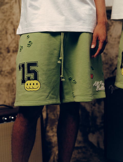 GREEN PATCH POCKET SWEATSHORTS