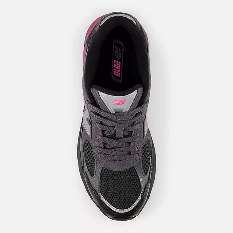 Top view of a black and grey mesh sneaker with pink accents and laces