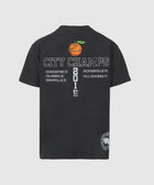 Black streetwear t-shirt back with CITY CHAMPS text, orange fruit graphic, and city names.