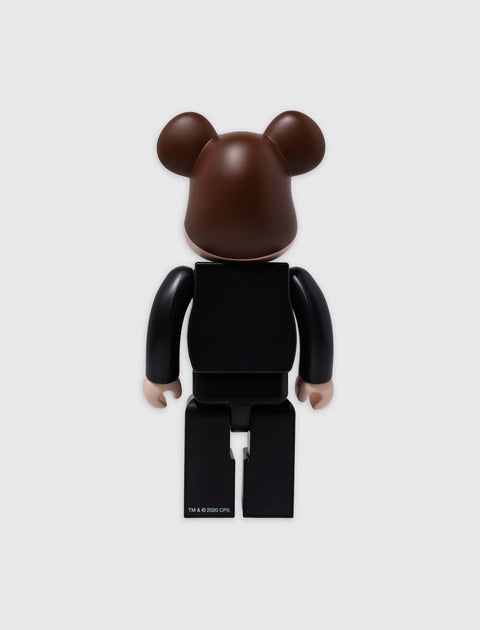 Back view of a black bear-shaped collectible vinyl figure with rounded ears