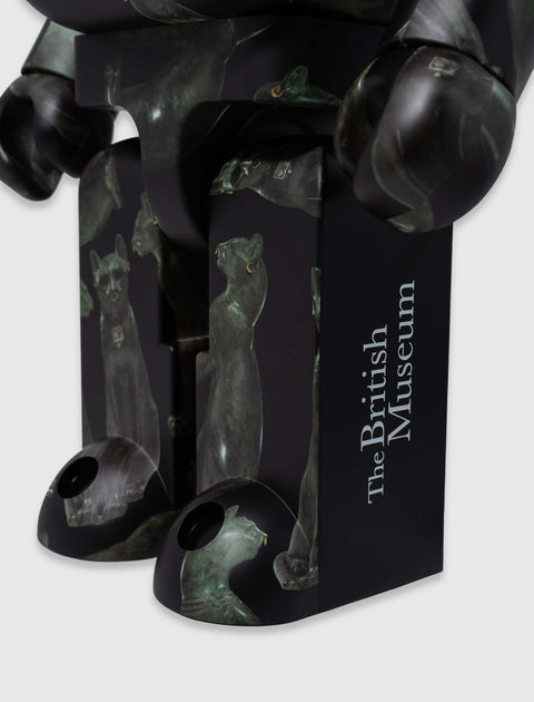 Close-up of collectible figure with ancient Egyptian cat art and 'The British Museum' text
