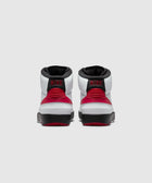 Rear view of white, red, and black high-top sneakers with NIKE logo on heel