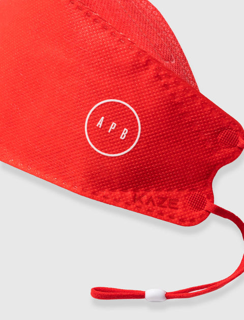 Red textured face mask with APB logo, adjustable ear loop, and KAZE branding