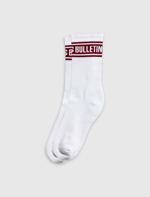 White crew socks with red stripe and BULLETIN text, men's streetwear apparel