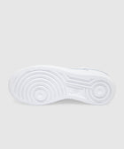 White sneaker outsole with circular traction pattern, viewed from the bottom