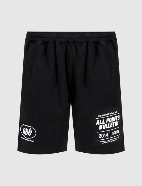 Black men's streetwear shorts with white graphic text, elastic waistband, and side pockets.